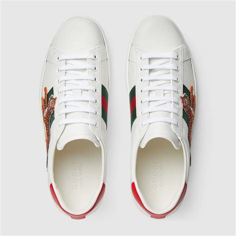 gucci arrow new ace sneakers|Gucci ace tiger sneakers.